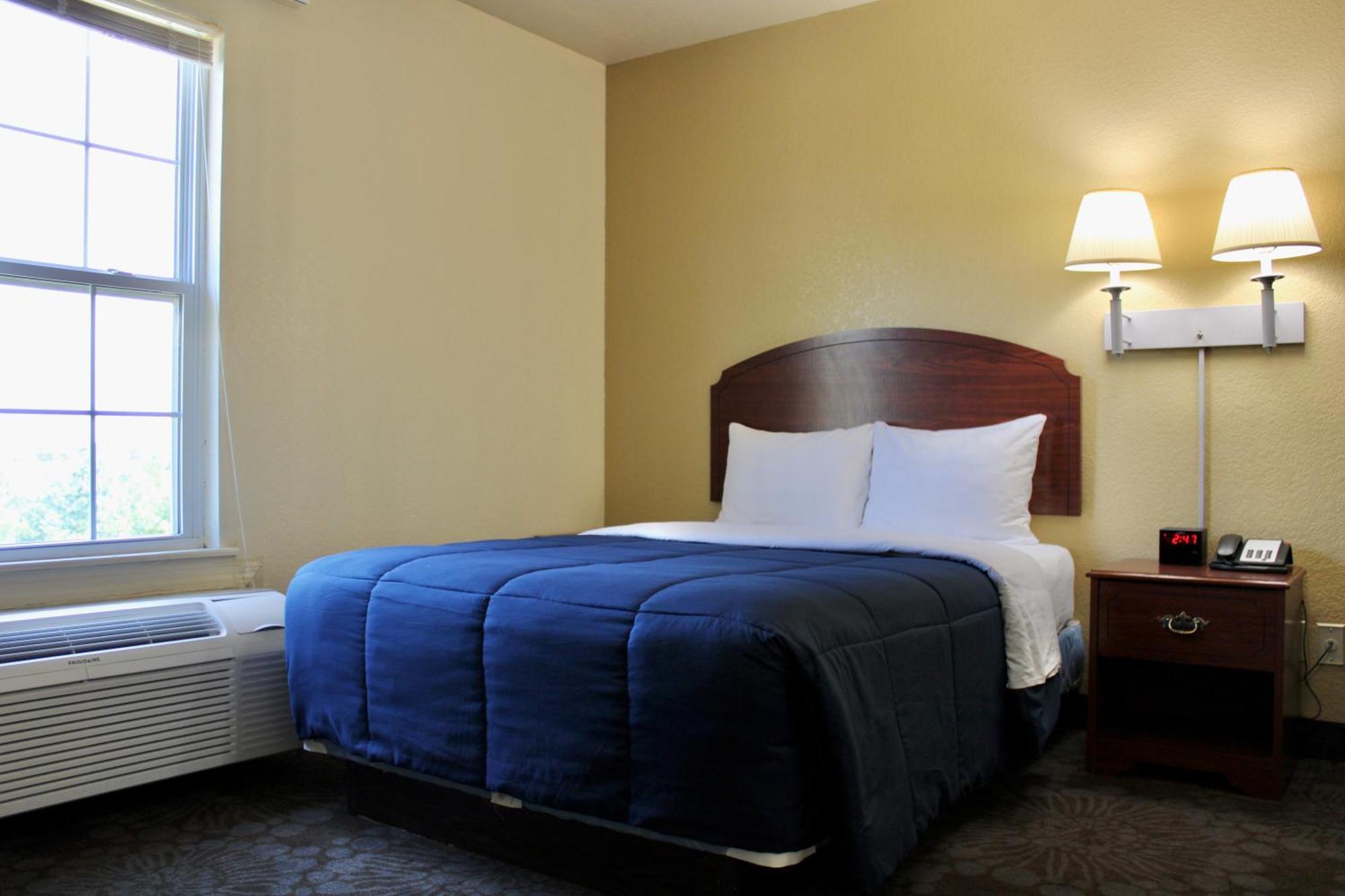 Candlelight Inn & Suites Hwy 69 Near マカリスター エクステリア 写真